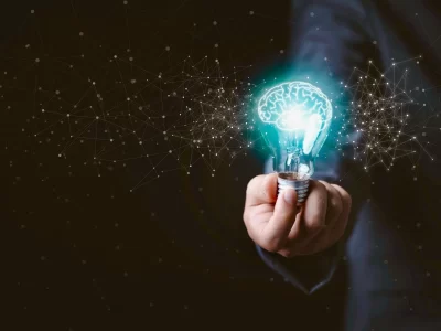 MEDICAL ASSESSMENTS IN UAE , Lightbulb brain symbol - medical intelligence, neurological innovation, and healthcare insights